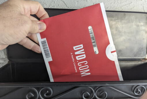 A Netflix DVD envelope is shown on Nov. 17, 2022 in San Francisco.  Subscribers to Netflix's DVD-by-mail service still look forward to opening up their mailbox and finding one of the discs delivered in the familiar red-and-white envelopes.