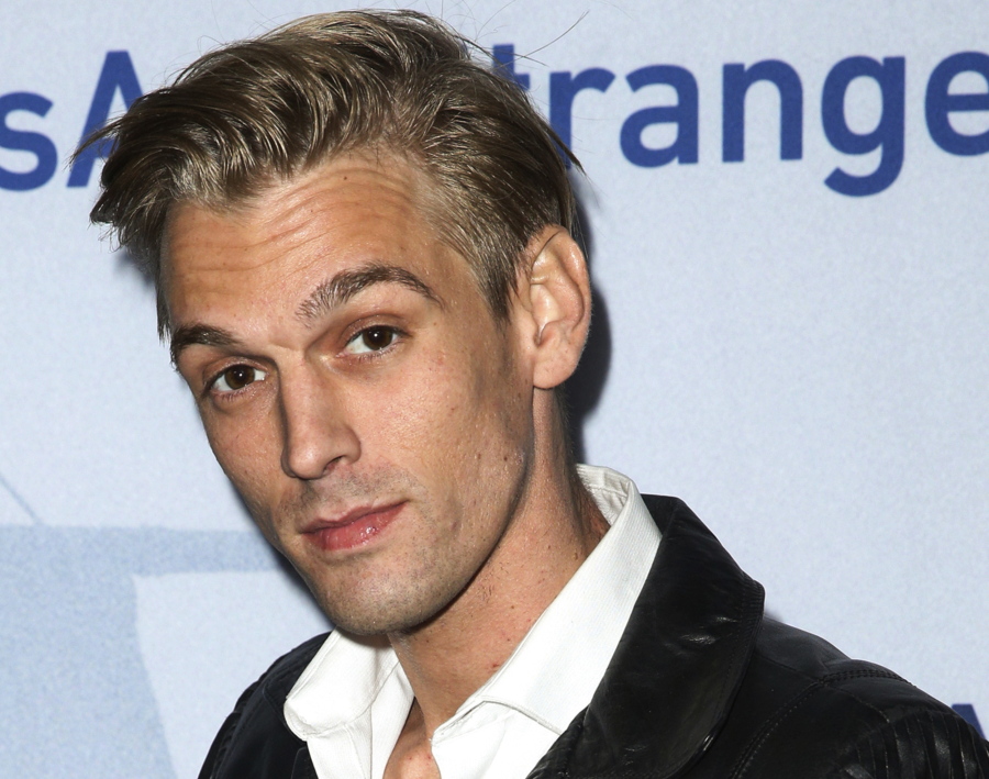 FILE - Singer Aaron Carter arrives at a premiere of "Saints & Strangers" at the Saban Theater in Beverly Hills, Calif., Nov. 9, 2015. Carter, the singer-rapper who began performing as a child and had hit albums starting in his teen years, was found dead Saturday, Nov. 5, 2022, at his home in Southern California. He was 34.