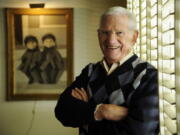 FILE - Actor, artist and singer Robert Clary poses for a portrait in his home studio on Feb. 26, 2014, in Beverly Hills, Calif.  Clary, who played a prisoner of war in the TV sitcom "Hogan's Heroes," died  Wednesday of natural causes at his home in Beverly Hills, Calif. He was 96.