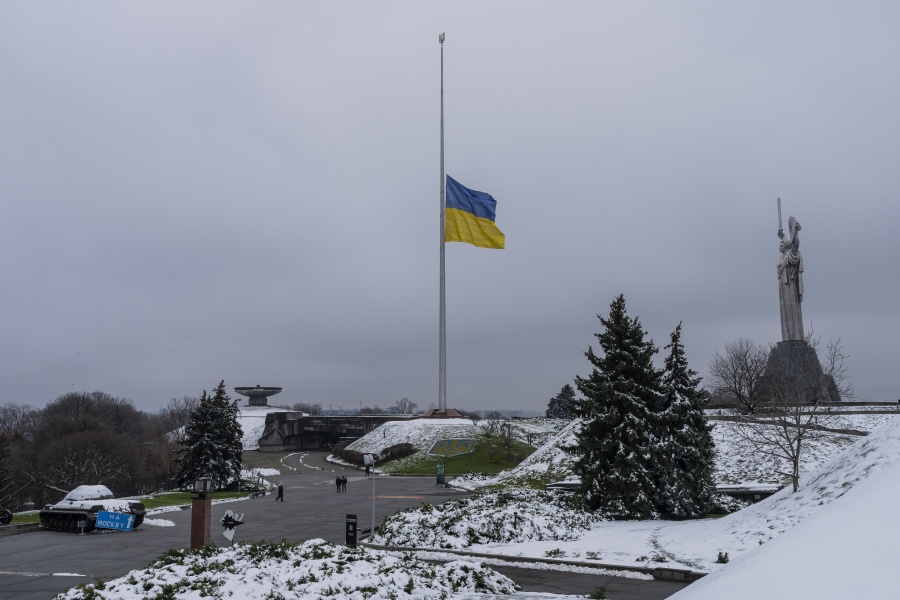 The Ukrainian flag flatters at half mast near the Ukrainian Motherland monument in Kyiv, Ukraine, Tuesday, Nov. 29, 2022.