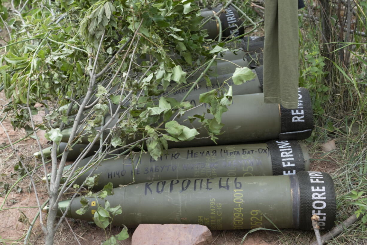 FILE - U.S.-supplied M777 howitzer shells lie on the ground to fire at Russian positions in Ukraine's eastern Donbas region June 18, 2022. The intense firefight over Ukraine has the Pentagon rethinking its weapons stockpiles. If another major war broke out today, would the U.S. have enough ammunition to fight? It's a question Pentagon planners are grappling with not only as the look to supply Ukraine for a war that could stretch for years, but also as they look to a potential conflict with China.