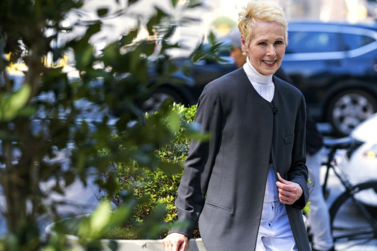 FILE - E. Jean Carroll poses for a photo, Sunday, June 23, 2019, in New York. Sexual assault victims in New York will get a one-time opportunity to sue their abusers starting Thursday under a new law expected to bring a wave of litigation against prison guards, middle managers, doctors and a few prominent figures including former President Donald Trump.