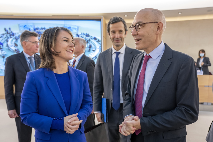 German Foreign Minister Annalena Baerbock, left, speaks with Volker Tuerk, right, UN High Commissioner for Human Rights, during a special Human Rights Council session at the European headquarters of the United Nations in Geneva, Switzerland, Thursday, Nov. 24, 2022.