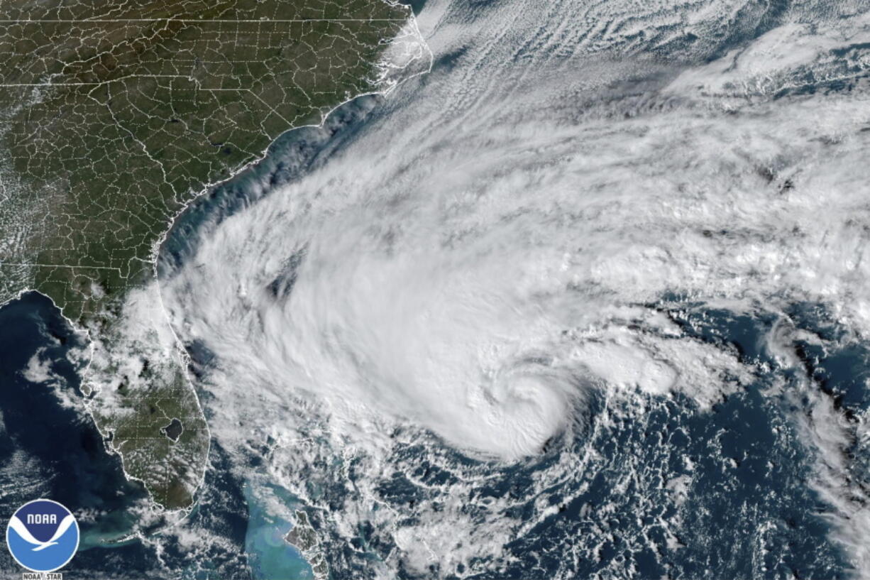 This GOES-East GoeColor satellite image taken at 2:36 p.m. EST and provided by NOAA shows Tropical Storm Nicole approaching toward the northwestern Bahamas and Florida's Atlantic coastline on Tuesday, Nov. 8, 2022.