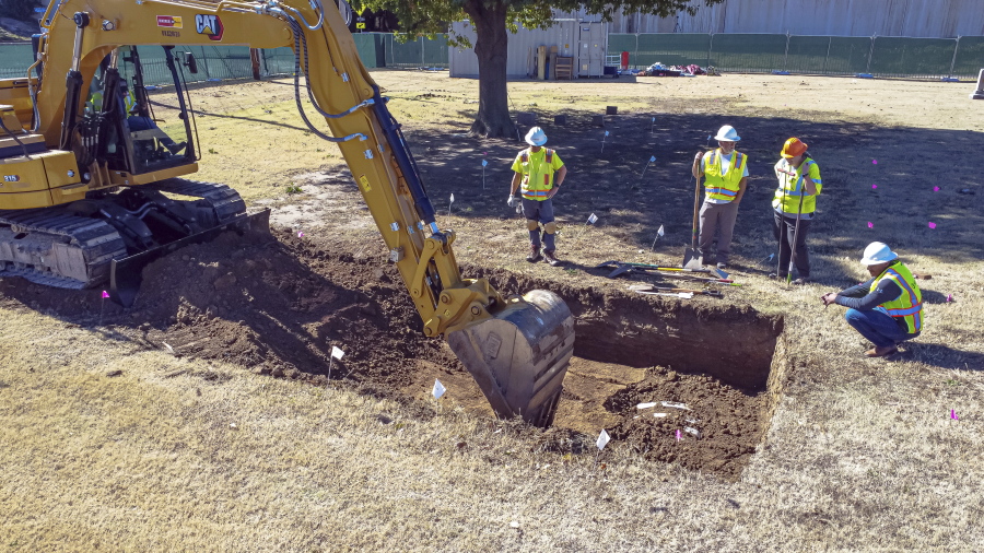 In this image provided by the City of Tulsa, Crews work on an excavation at Oaklawn Cemetery searching for victims of the 1921 Tulsa Race Massacre on Wednesday, Oct. 26, 2022, in Tulsa, Okla. Officials say the search for remains of victims of the 1921 Tulsa Race Massacre has turned up 21 additional graves in the city's Oaklawn Cemetery.