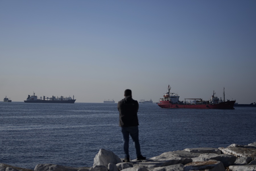 Cargo ships anchored in the Marmara Sea await to cross the Bosphorus Straits in Istanbul, Turkey, Tuesday, Nov. 1, 2022. Turkey's defense minister urged Russia to "reconsider" its decision to suspend the implementation of the U.N. and Turkish-brokered grain deal in a telephone call Monday with his Russian counterpart, Sergei Shoigu.
