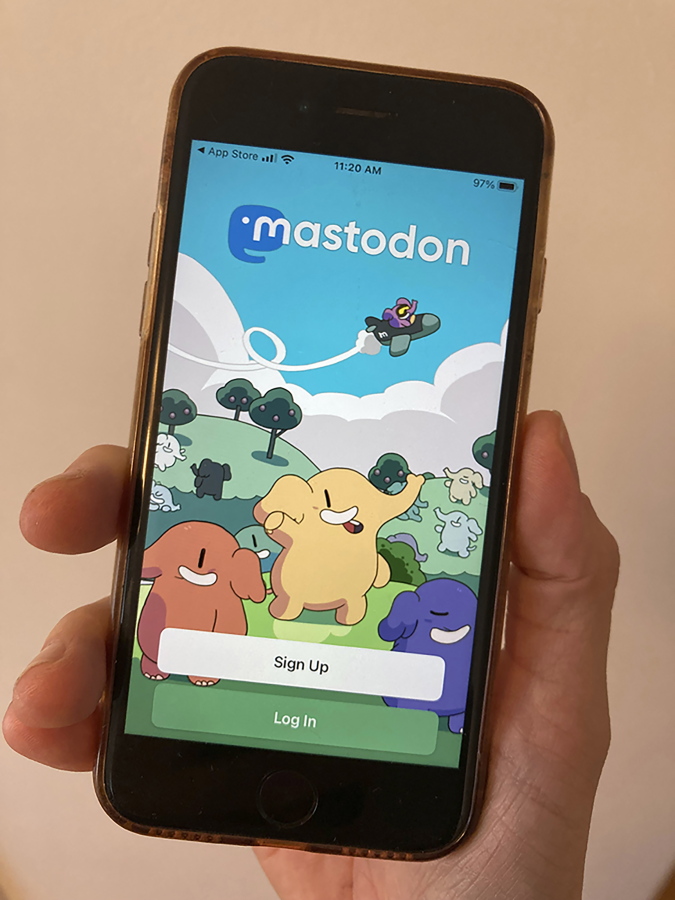 The Mastodon site is shown on a smart phone in Oakland, Calif., on Friday, Nov. 11, 2022. Sites like Mastodon and even Tumblr are emerging as new (or renewed) alternatives to Twitter.