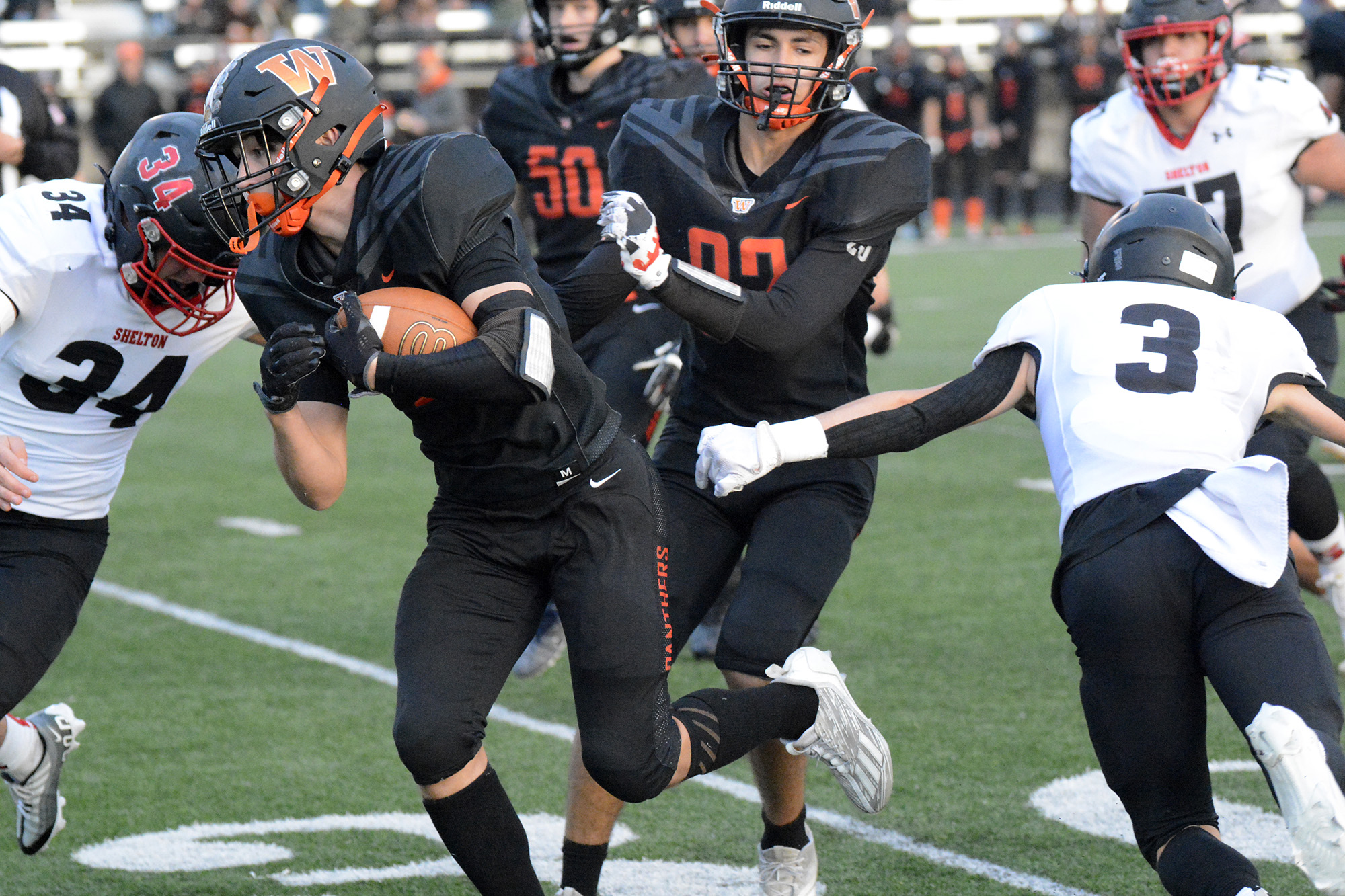 Washougal's Liam Atkin runs with the ball during the Panthers' 38-34 over Shelton in a 2A district playoff in Washougal on Saturday, Nov. 5, 2022.