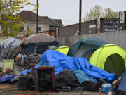 Tents line West 12th Street near the Share House in downtown Vancouver on May 12, 2022.