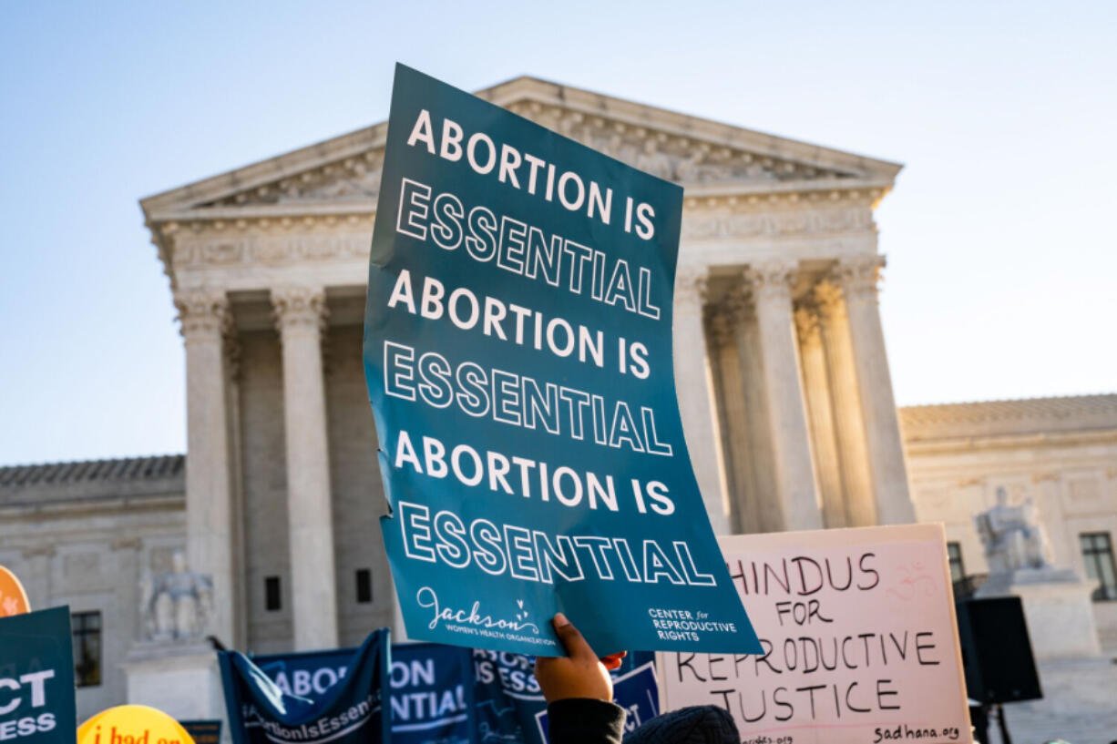 Abortion rights advocates and anti-abortion protesters demonstrate in front of the Supreme Court of the United States on Dec. 1, 2021, in Washington, D.C., before the justices' 2022 decision to overturn the 1973 Roe v. Wade decision.