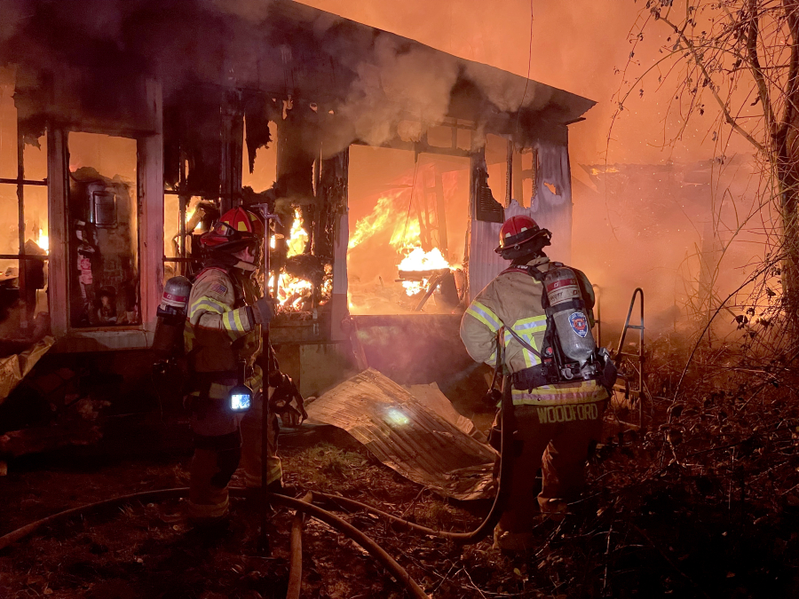 A mobile home caught fire early Thursday morning east of Ridgefield. Once firefighters extinguished the blaze, they found two people and several pets dead inside.