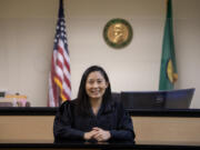 The newest Clark County Superior Court judge, Tsering Cornell, poses for a portrait in her Vancouver courtroom. As the daughter of two Tibetan immigrants, Cornell remains connected with local Tibetan groups. The community celebrated her judicial appointment, which it says makes her the first Tibetan American judge in the United States.