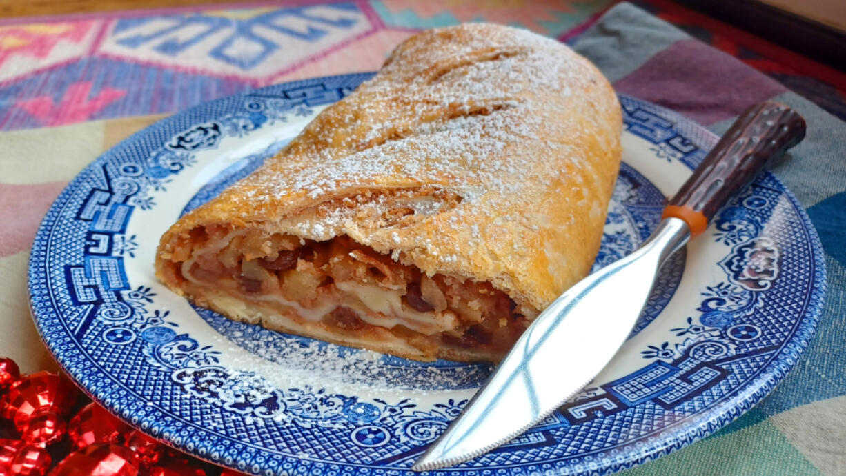 This classic dessert is just right for the holidays with cinnamon-laced apples and raisins enveloped in buttery pastry.