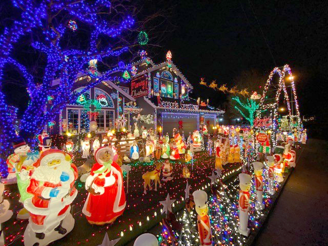 The Buchanan home in east Vancouver features 100,000 lights and an army of marching figurines.