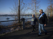 LEADOPTION Pam and George Fich keep in step along the Vancouver Waterfront. Daily exercise helped him lose 70 pounds on doctor's orders.