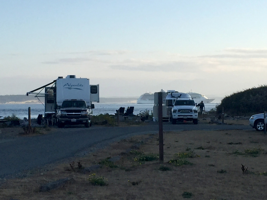 An Alaska-bound cruise ship passes the campground at Fort Casey State Park on Whidbey Island.