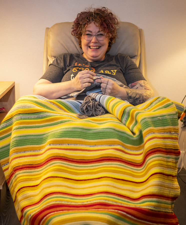 Her grandchild will know she's the coolest -- and the warmest. Jene McMahon of Hazel Dell beams over the temperature blanket she's been crocheting all year. Every colored line in the blanket signals the high temperature for a single day. Yellows and reds mean warm and hot days.
