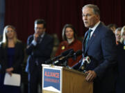 Washington Gov. Jay Inslee speaks Thursday, Feb. 14, 2019, in Seattle at an event held by the Alliance for Gun Responsibility to mark the one-year anniversary of the shooting at Marjory Stoneman Douglas High School in Parkland, Florida, and to talk about efforts in Washington state to reduce gun violence. (AP Photo/Ted S.