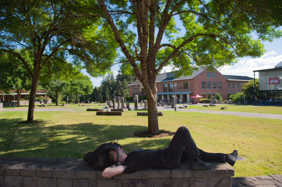 A student takes a break before  classes begin Aug. 22, the first day of classes at the Washington State University Vancouver campus. Vancouver ranked 92nd on a list of 400 best college cities and towns nationwide created by WalletHub.