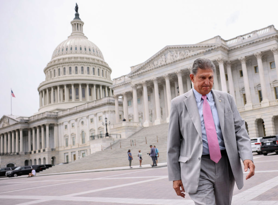 Sen. Joe Manchin, D-W.V., leaves the U.S. Capitol following a vote on August 3, 2021 in Washington, DC. Manchin wants to limit the Child Tax Credit by imposing work requirements, even though his state is one of the most poverty-bound in the nation.