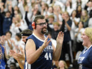 Skyview Unified athlete Lucas Anderson celebrates making a basket during a demonstration game to celebrate Skyview High School's designation as a Special Olympics Unified Champion School.