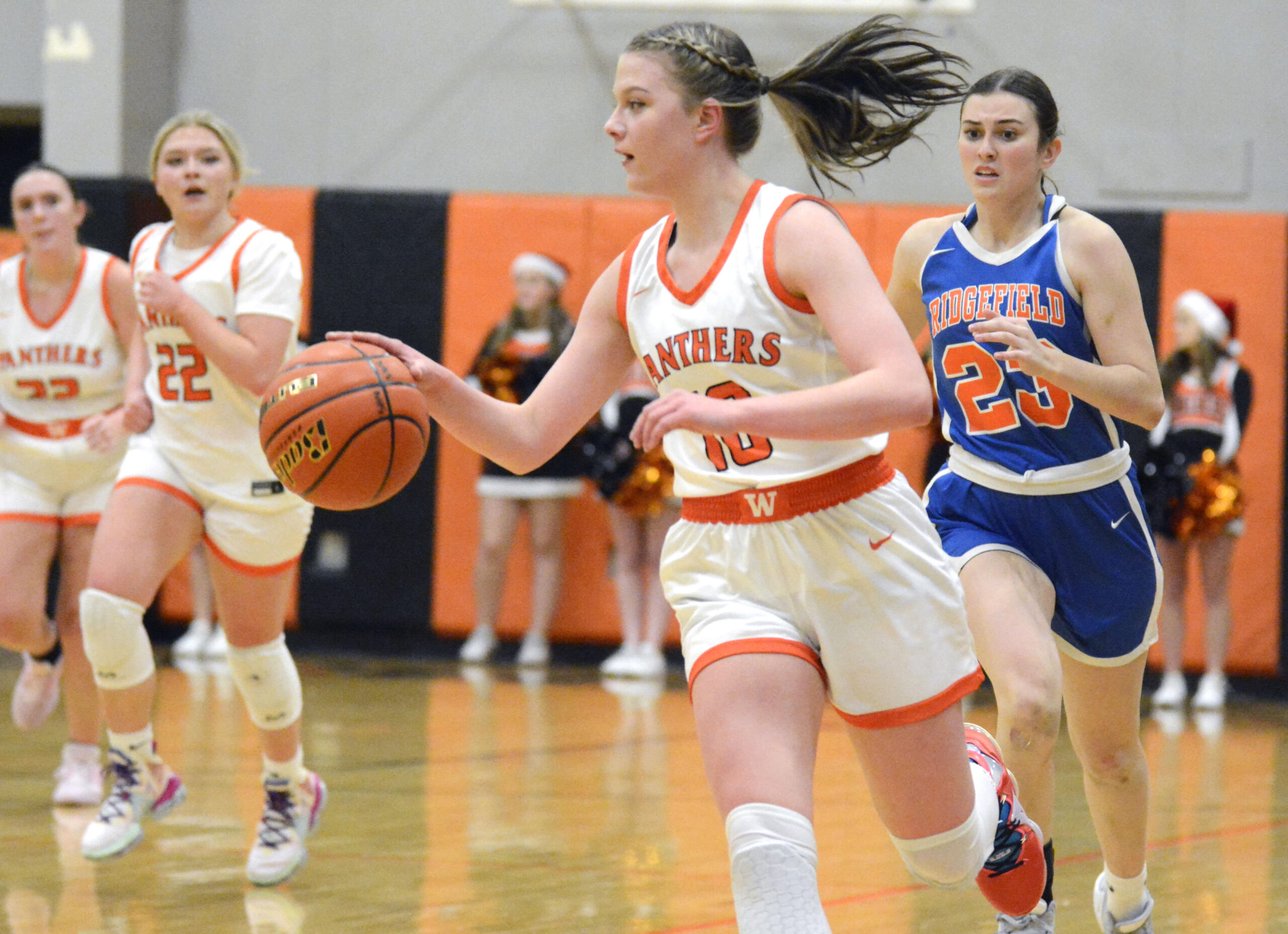 Washougal’s Isabella Albaugh (10) looks to push the pace in transition during a 2A GSHL girls basketball game against Ridgefield on Wednesday, Dec. 14, 2022, at Washougal High School.