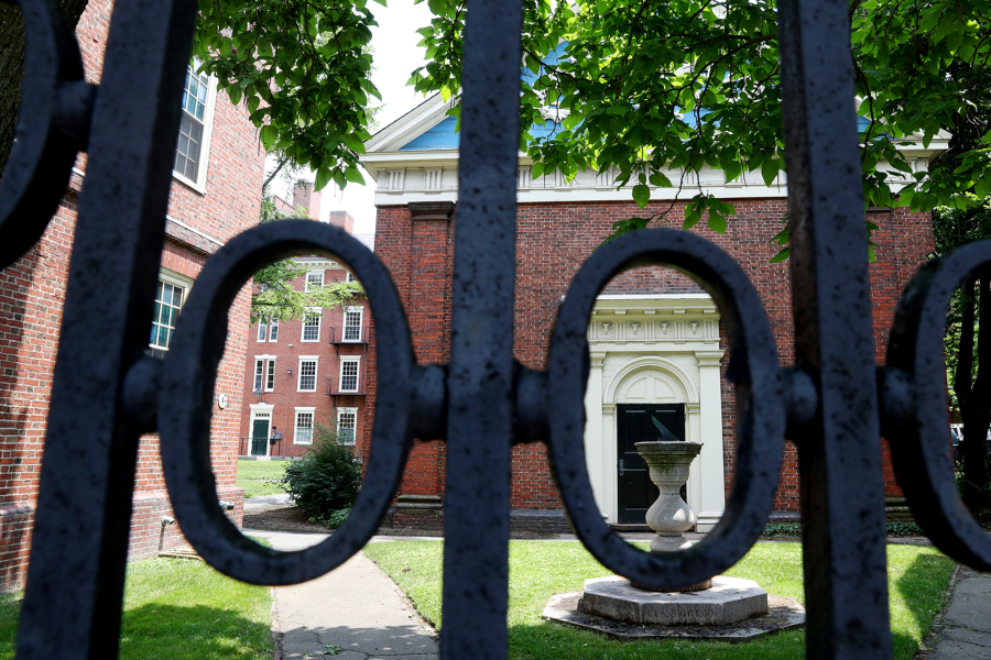 A view of a gate to Harvard Yard on the campus of Harvard University on July 8, 2020, in Cambridge, Massachusetts.