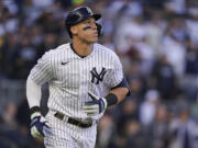 New York Yankees' Aaron Judge has agreed to return to the Yankees on a $360 million, nine-year contract, according to a person familiar with the deal. The person spoke to The Associated Press on Wednesday, Dec. 7, 2022 because the deal had not been announced.