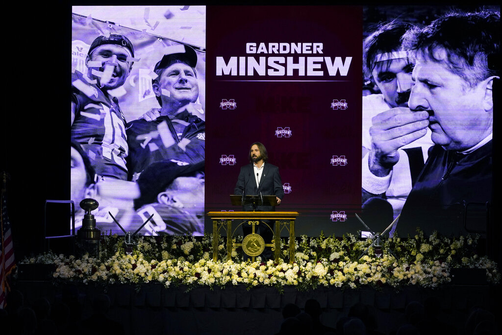 Philadelphia Eagles quarterback Gardner Minshew speaks about the importance of his relationship with the late Mississippi State football coach Mike Leach, during his memorial service at Humphrey Coliseum on the university's campus in Starkville, Miss., Tuesday, Dec. 20, 2022. Leach, who died, Dec. 12, 2022, from complications related to a heart condition at 61, had been Minshew's coach at Washington State. (AP Photo/Rogelio V.