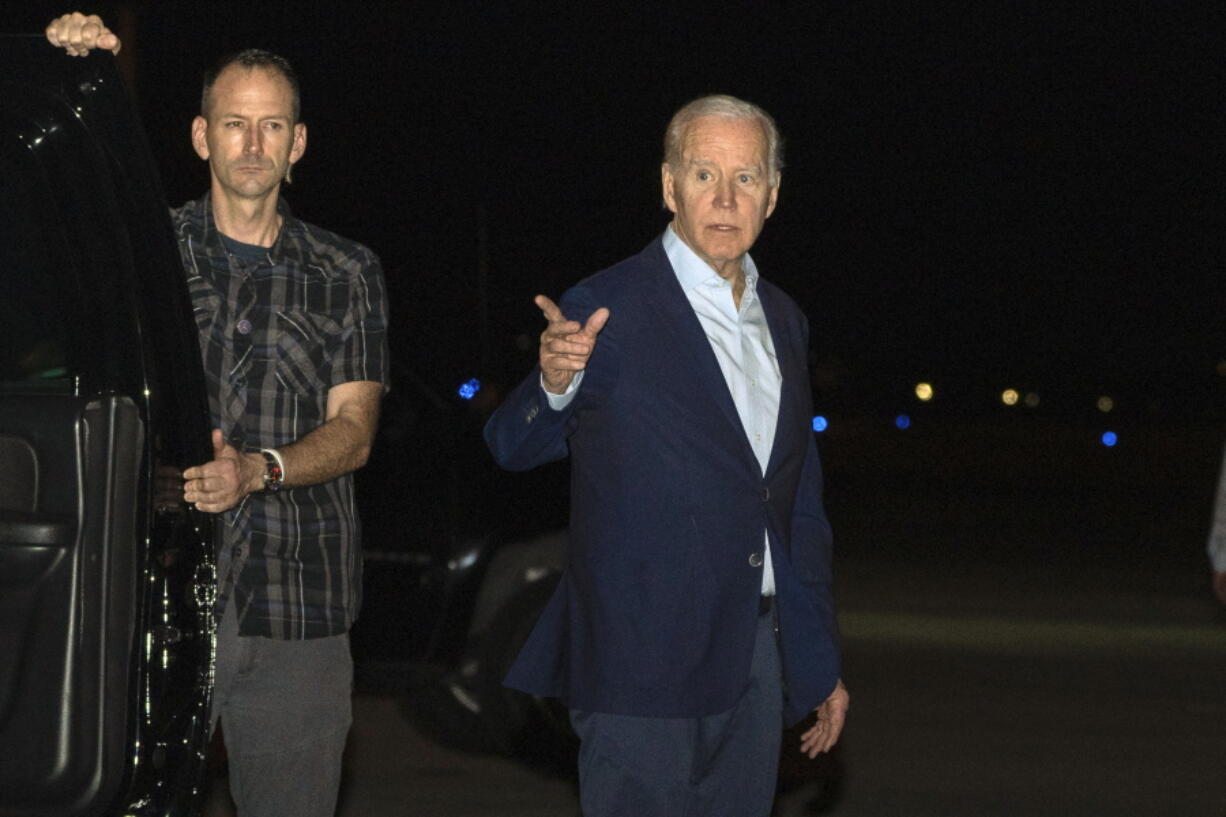 President Joe Biden arrives at Henry E. Rohlsen Airport, in St. Croix, U.S. Virgin Islands, late Tuesday, Dec. 27, 2022. Biden and his family are traveling to St. Croix to celebrate the New Year.