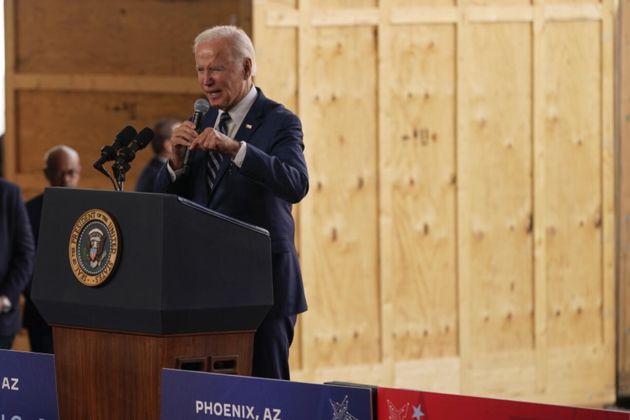 President Joe Biden speaks about his economic agenda after touring the building site for a new computer chip plant for Taiwan Semiconductor Manufacturing Company, Tuesday, Dec. 6, 2022, in Phoenix.