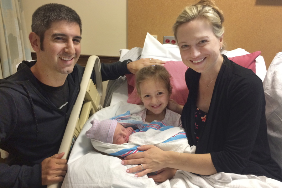Amy Bianchi of Albany, N.Y., with her newborn son, Brayden, with his father, Christopher, and sister, Mia, at Bellevue Woman's Center in Niskayuna, N.Y., in 2018.