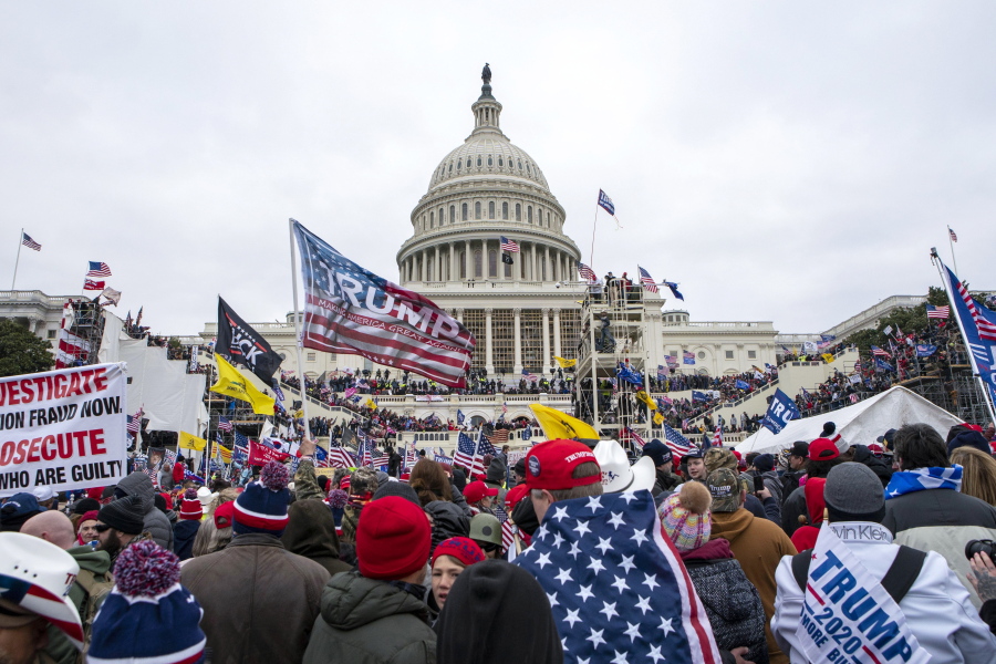 FILE - Rioters loyal to President Donald Trump rally at the U.S. Capitol in Washington on Jan. 6, 2021.  The House committee investigating the Jan. 6 attack on the U.S. Capitol is expected to interview former Secret Service agent Tony Ornato on Tuesday about Donald Trump's actions on the day of the insurrection.