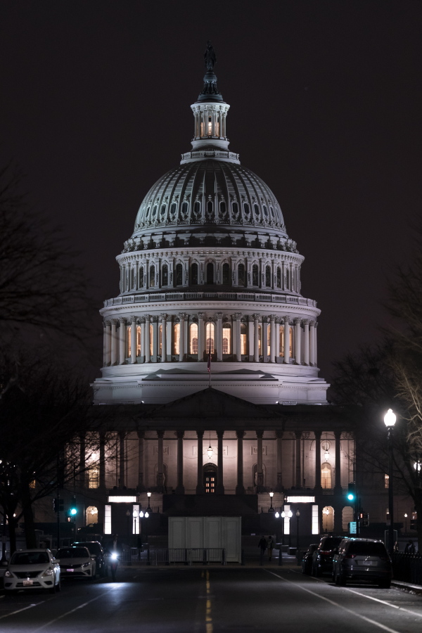 The Capitol is seen Wednesday evening as the House of Representatives works to approve the Respect for Marriage Act, a bill already passed in the Senate to codify both interracial and same-gender marriage, in Washington, Dec. 7, 2022. (AP Photo/J.