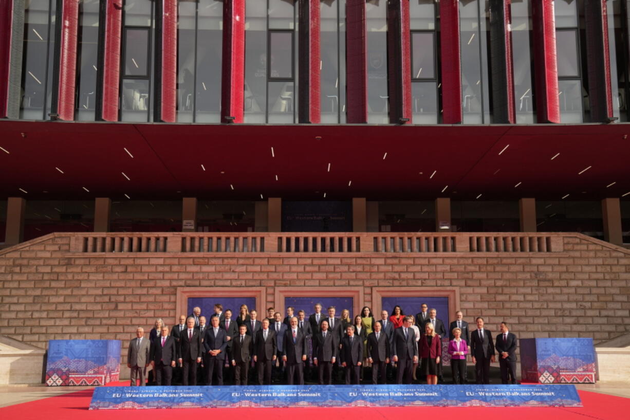 European Union and Western Balkan leaders pose during a group photo at an EU-Western Balkans Summit, in Tirana, Albania, Tuesday, Dec. 6, 2022. EU leaders and their Western Balkans counterparts gathered Tuesday for talks aimed at boosting their partnership as Russia's war in Ukraine threatens to reshape the geopolitical balance in the region.