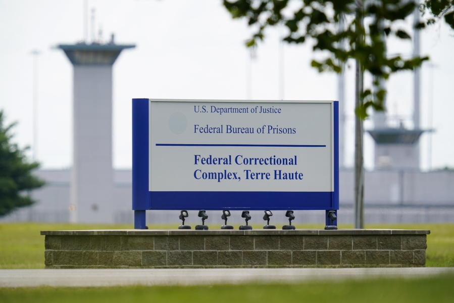 FILE - This Aug. 28, 2020, photo shows the federal prison complex in Terre Haute, Ind. An unprecedented string of federal executions likely acted as a COVID-19 superspreader event, just as health experts warned could happen when the Trump administration insisted on resuming executions during a pandemic.