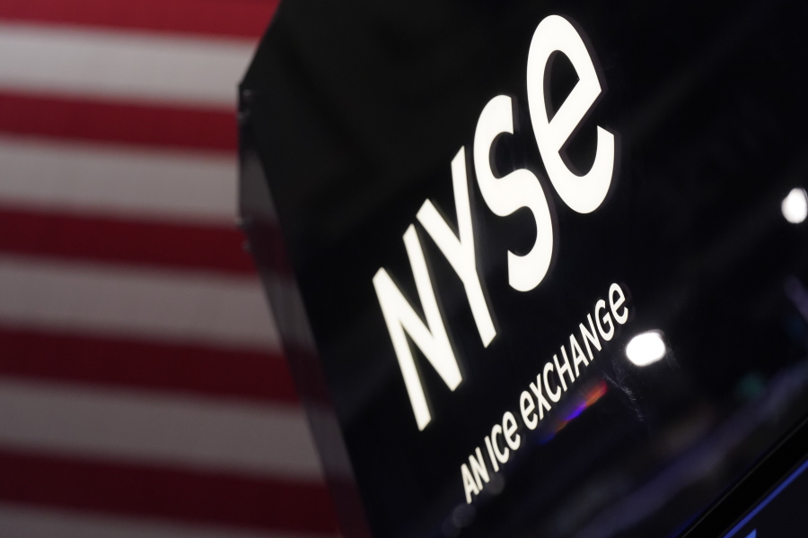 FILE - An NYSE sign is displayed at the New York Stock Exchange in New York, on Nov. 28, 2022. Stocks edged higher in morning trading on Wall Street Wednesday, Dec. 28, 2022, as investors count down to the end of the worst year for the S&P 500 since 2008.