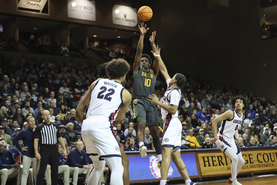 Baylor guard Adam Flagler (10) shoots a fadeaway jump shot during the first half of an NCAA college basketball game against Gonzaga, Friday, Dec. 2, 2022, in Sioux Falls, S.D.