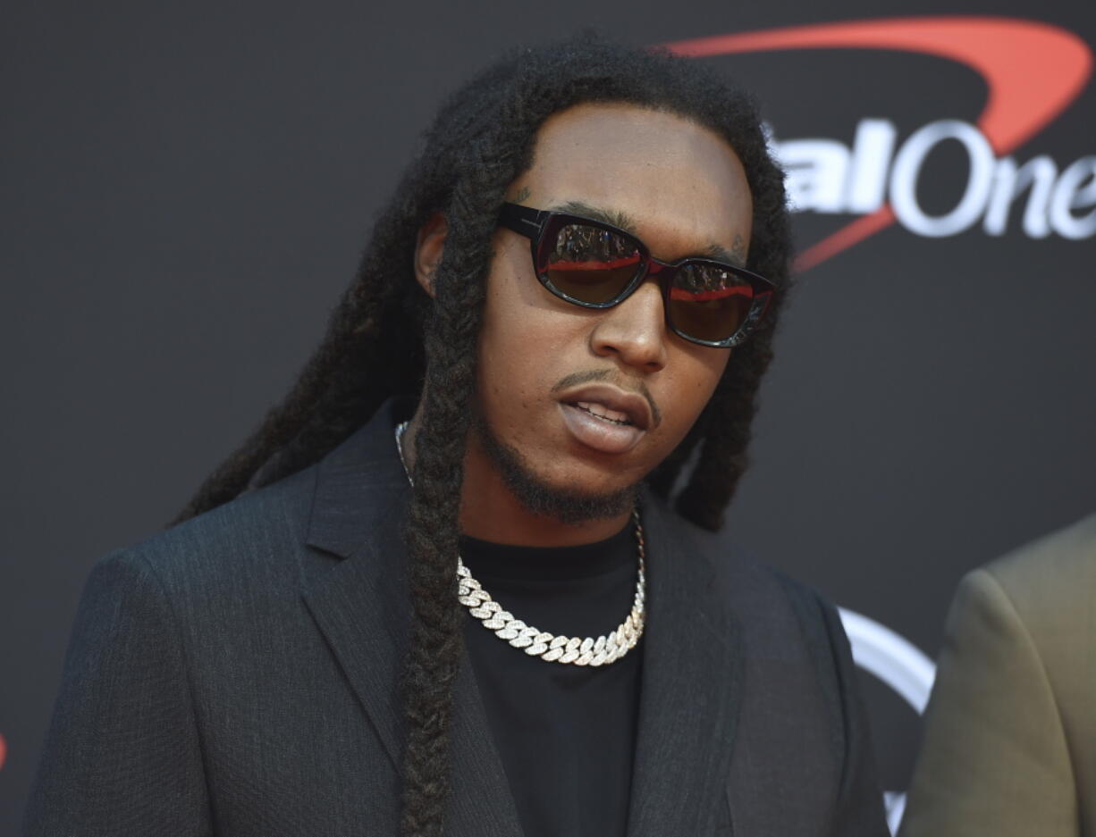 FILE - Takeoff arrives at the ESPY Awards in Los Angeles on July 10, 2019. On Friday, Dec. 2, 2022, police announced that they have arrested a 33-year-old man in connection with the fatal shooting of rapper Takeoff, who was killed last month outside a bowling alley in Houston.