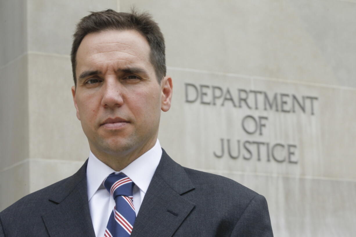 FILE - Jack Smith, the Department of Justice's chief of the Public Integrity Section, poses for a photo at the Department of Justice in Washington, Aug. 24, 2010. Smith, the prosecutor named as special counsel to oversee investigations related to former President Donald Trump, has a long career confronting public corruption and war crimes.