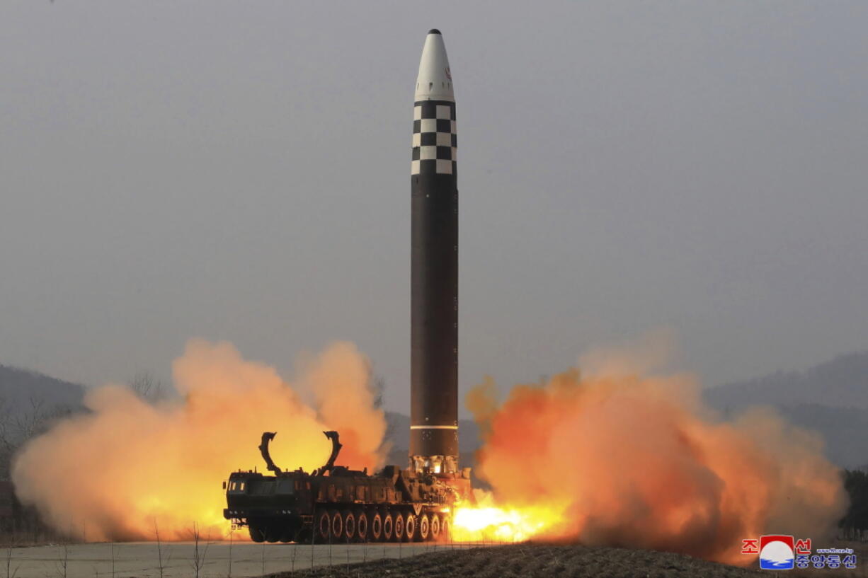 FILE - This photo distributed by the North Korean government shows what it says a test-fire of a Hwasong-17 intercontinental ballistic missile (ICBM), at an undisclosed location in North Korea on March 24, 2022. Independent journalists were not given access to cover the event depicted in this image distributed by the North Korean government. The content of this image is as provided and cannot be independently verified. Korean language watermark on image as provided by source reads: "KCNA" which is the abbreviation for Korean Central News Agency.