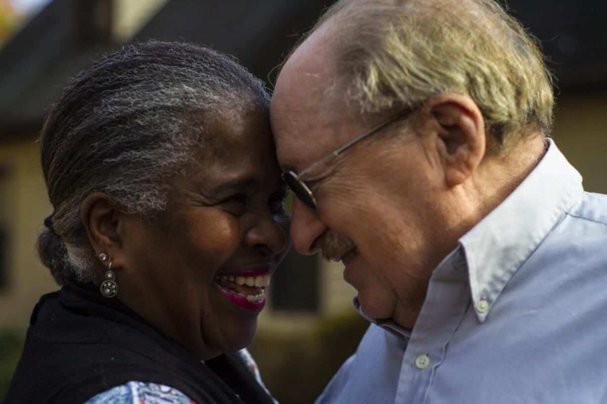 Paul Fleisher and his wife Debra are seen Monday, Dec. 5, 2022, at their home in Henrico County, Va. The Fleisher's have been married since 1975, seven years after the U.S. Supreme Court struck down laws prohibiting interracial marriage in the landmark case Loving v. Virginia. (AP Photo/John C.