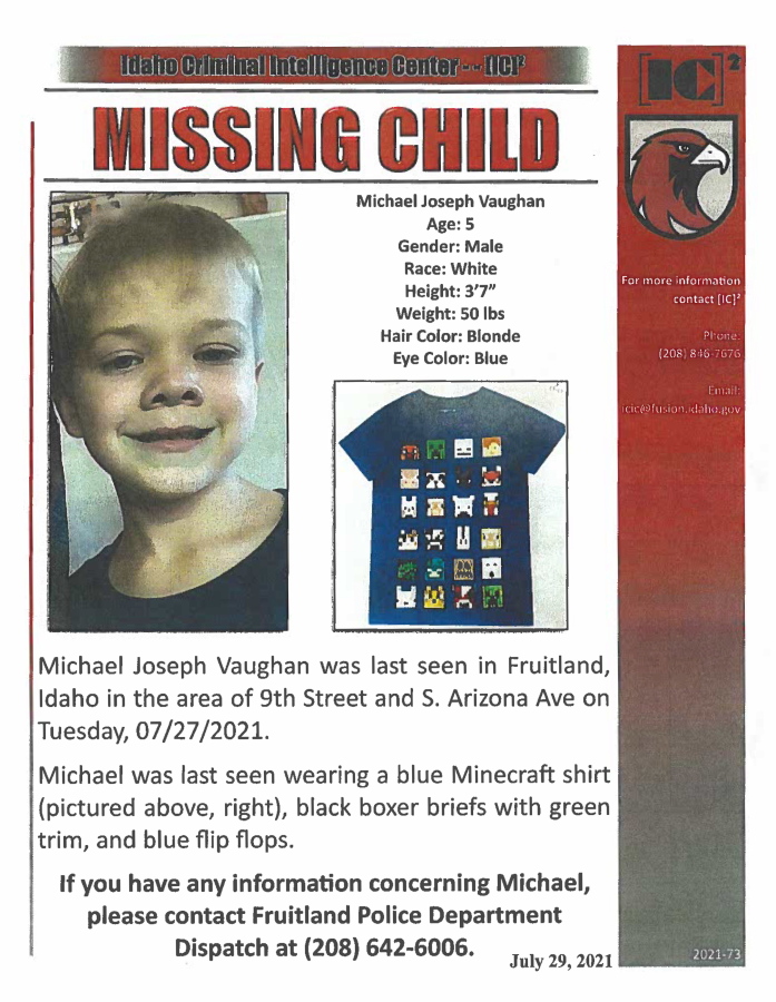 FILE - This Missing Child poster, provided by the Fruitland, Idaho, Police Department, shows Michael Joseph Vaughan who has been missing since July 27, 2021. Police in southwestern Idaho said Thursday, Dec. 1, 2022, they believe they have found the place where the body of a missing 5-year-old boy was temporarily buried, but they still haven't found little Michael Vaughan's remains. The boy, nicknamed "Monkey," disappeared while playing outside his home in the small town of Fruitland nearly a year and a half ago.