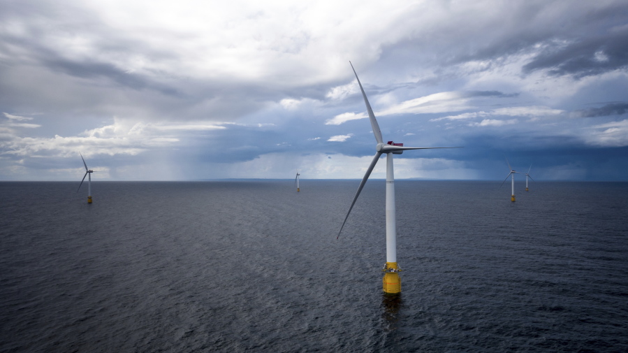 Hywind Scotland, the world's first commercial wind farm using floating wind turbines, is visible off the coast of Scotland in August 2017. Tuesday, Dec. 6, 2022, marks the first-ever U.S. auction for leases to develop commercial-scale floating wind farms in the deep waters off the West Coast.