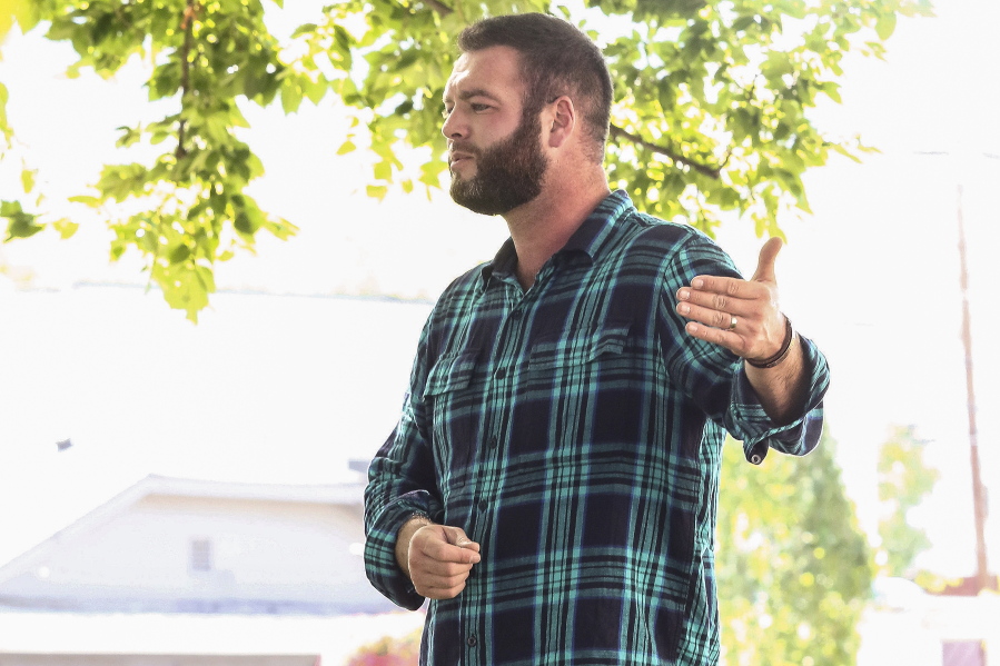 FILE - State Rep. Dallas Heard speaks to a group of about 90 people during a rally in front of the Douglas County Courthouse in Roseburg, Ore., on Aug. 25, 2020. Heard, a Republican state senator in Oregon who once led the state GOP party abruptly resigned Thursday, Dec. 15, 2022.