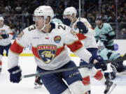 Florida Panthers center Carter Verhaeghe (23) skates from the goal after scoring his second goal of the night against the Seattle Kraken, during the first period of an NHL hockey game, Saturday, Dec. 3, 2022, in Seattle.