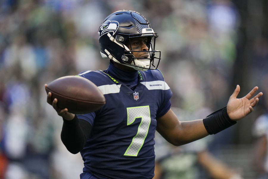 Seattle Seahawks quarterback Geno Smith (7) reacts to an incomplete pass against the Carolina Panthersduring the second half of an NFL football game, Sunday, Dec. 11, 2022, in Seattle.