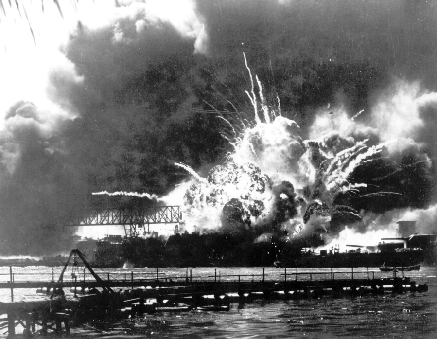 FILE - In this photo released by the U.S. Navy, the destroyer USS Shaw explodes after being hit by bombs during the Japanese surprise attack on Pearl Harbor, Hawaii, December 7, 1941. A few centenarian survivors of the attack on Pearl Harbor are expected to gather at the scene of the Japanese bombing on Wednesday, Dec. 7, 2022, to remember those who perished 81 years ago. (U.S.