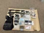 Clark County sheriff's deputies recovered firearms, four of which were stolen; ammunition; ballistic-style body armor; nearly a quarter-pound of suspected methamphetamine; and more than 2,500 suspected fentanyl pills from a storage unit Nov. 28 in Hazel Dell.