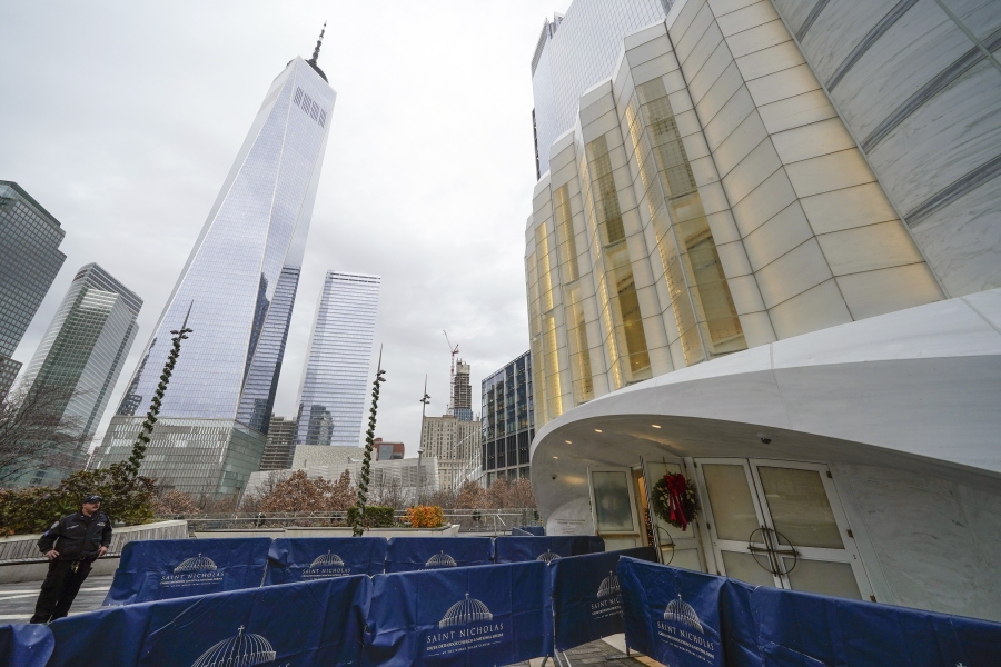 One World Trade, left, is seen next to St. Nicholas Greek Orthodox Church in New York.